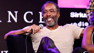 Alt text: Lee Daniels speaks at an entertainment industry event.